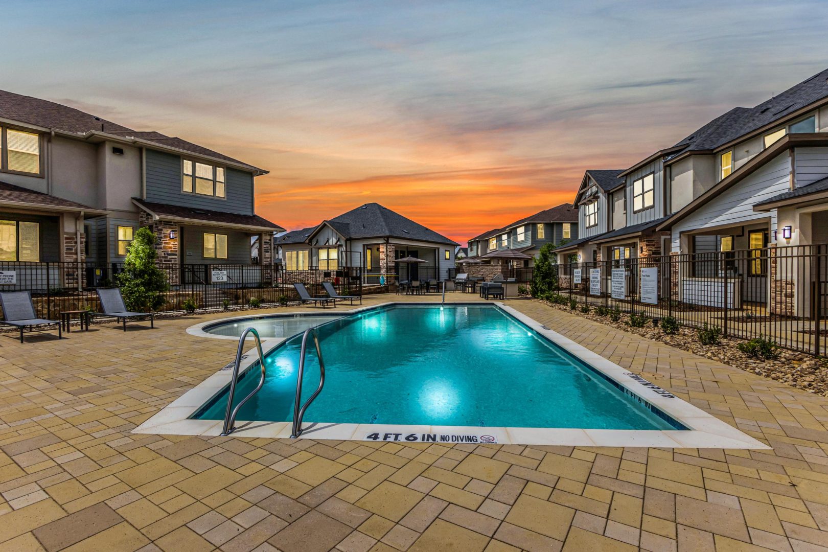 the pool at sunset at The Town Arlington