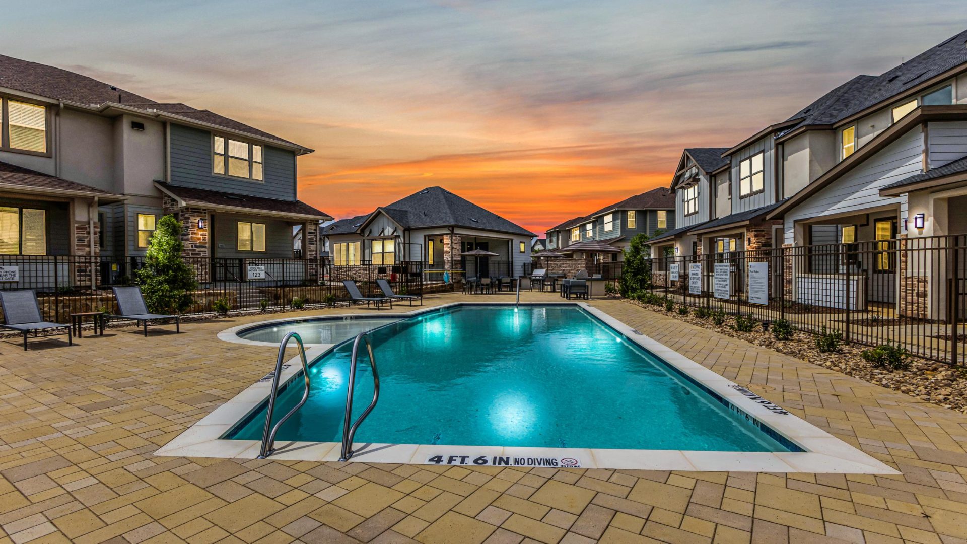 the pool at sunset at The Town Arlington