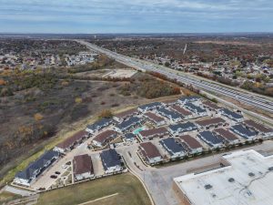 an aerial view of a residential area with a large parking lot at The Town Arlington