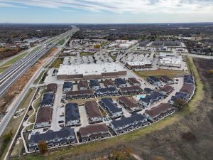 an aerial view of a residential area with a highway at The Town Arlington