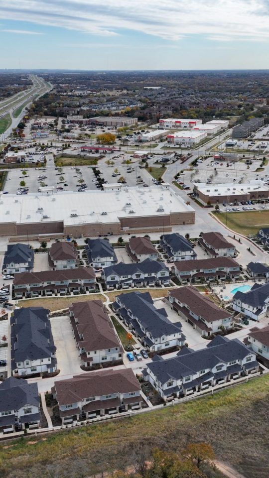 an aerial view of a residential area with a highway at The Town Arlington